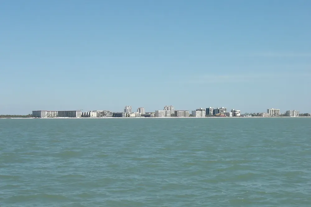 Low-rise and high-rise condominiums along the Bonita Beach waterfront in Bonita Springs, Florida